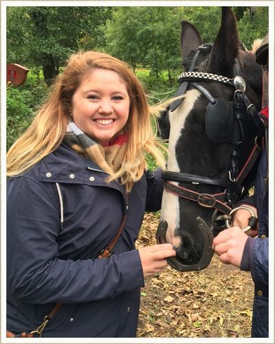 Ashleigh with the jaunting car horse and the horseshoe in Killarney National Park, Ireland